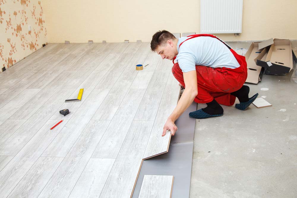 handyman laying floor